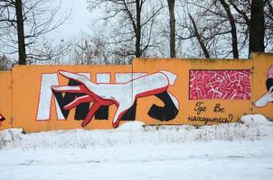 Fragment of colored street art graffiti paintings with contours and shading close up photo
