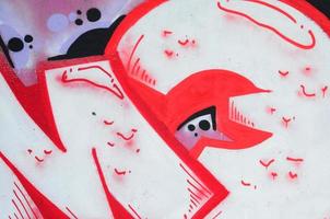 Fragmento de pinturas de graffiti de arte callejero de colores con contornos y sombreado de cerca foto