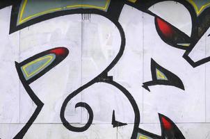 Fragment of colored street art graffiti paintings with contours and shading close up photo