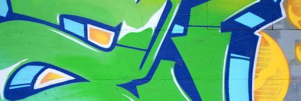 Fragment of colored street art graffiti paintings with contours and shading close up photo