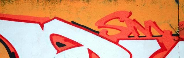 Fragment of colored street art graffiti paintings with contours and shading close up photo