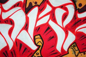 Fragment of colored street art graffiti paintings with contours and shading close up photo