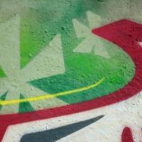 Street art. Abstract background image of a fragment of a colored graffiti painting in chrome and red tones photo