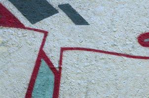 Street art. Abstract background image of a fragment of a colored graffiti painting in chrome and red tones photo