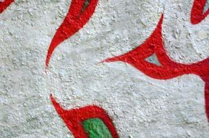 Street art. Abstract background image of a fragment of a colored graffiti painting in chrome and red tones photo