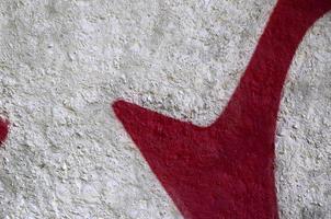 Street art. Abstract background image of a fragment of a colored graffiti painting in chrome and red tones photo