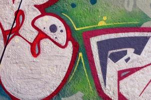 Street art. Abstract background image of a fragment of a colored graffiti painting in chrome and red tones photo