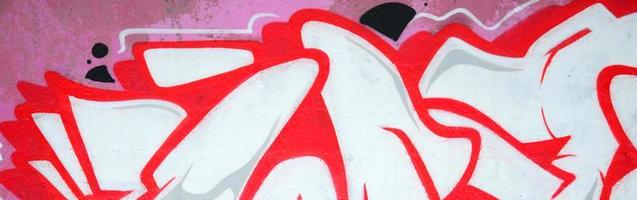 Fragment of colored street art graffiti paintings with contours and shading close up photo