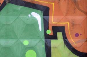 Fragment of colored street art graffiti paintings with contours and shading close up photo