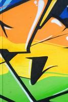 Fragment of colored street art graffiti paintings with contours and shading close up photo