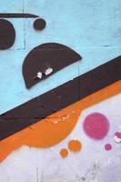 Fragment of colored street art graffiti paintings with contours and shading close up photo