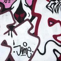 Fragment of colored street art graffiti paintings with contours and shading close up photo