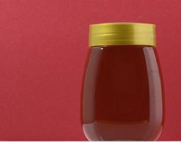 Isolated honey jar photo