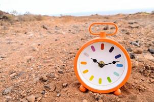 Clock on the ground photo