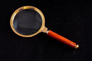 Isolated magnifying glass photo