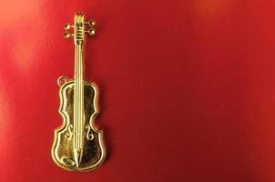 Gold violin miniature photo