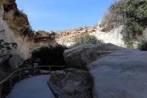 Cave in the chalk cliffs in southern Israel. photo