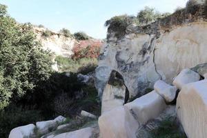 Cave in the chalk cliffs in southern Israel. photo