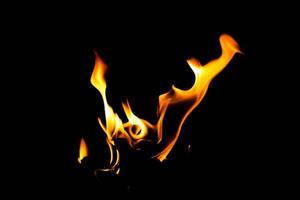 Fire flame texture. Burning material backdrop. Burn effect pattern. Blaze and torch wallpaper. Heat and haze backdrop. photo