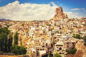 Ortahisar fortress in Cappadocia, popular tourist destination, front view with dynamic sky cloudscape static timelapse photo