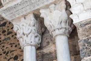 St Michael Abbey - Sacra di San Michele - Italy. Gargoyle monster sculpture, 11th Century. photo