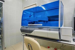 treatment room in a modern clinic or medical laboratory with equipment photo