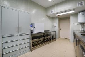 treatment room in a modern clinic or medical laboratory with equipment photo