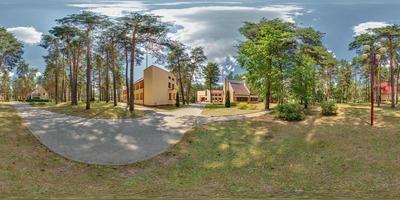 full seamless hdri 360 panorama outside vacation concrete homestead or brick country houses in pinery forest in equirectangular spherical projection in sunny day with clouds in sky photo