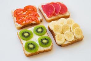 bright mix sandwiches for breakfast fruit, vegetables photo