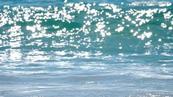 Waves rolled on the sand of Mai Khao Beach, Phuket, Thailand. Slow motion video