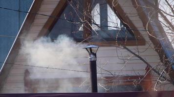 Smoke from the stove in the garden house comes from a pipe video