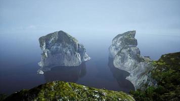 Aerial view of the beautiful cliffs in the sea photo