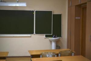 Green blackboard for writing texts. School blackboard. photo