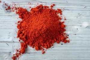 Food spice pile of red ground pepper photo