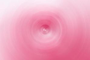 Pink blurred abstract background of colorful spin circle radial. Simple ripple pattern background. Abstract pink white soft light gradient swirling cloud background in pastel color photo