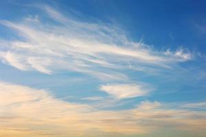 Bright Blue sky with white cloud. Beautiful sky background and wallpaper. Clear day and good weather in the morning. photo