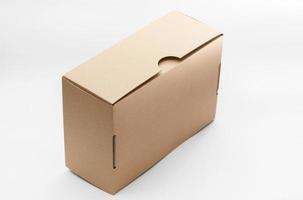 Closed empty cardboard box isolated on a white background photo