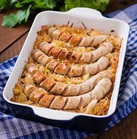 Munich sausages with fried cabbage photo