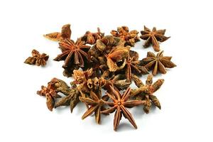 Chinese spice star anise fruit isolated on white background Star aniseed Badian khatai photo