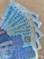 Pakistani Currency 1000 Notes, Thousand Rupees photo