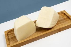 Minas half-cured cheese, on a bamboo tray,