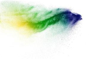 Abstract colorful dust particles textured background.Multicolored particles explosion on white background. photo