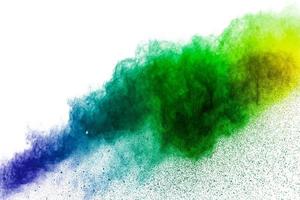 Multicolor powder explosion on white background. Colored cloud. Colorful dust explode. Paint Holi. photo