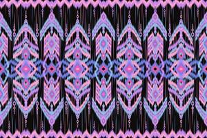 Ethnic ikat chevron pattern background Traditional pattern on the fabric in Indonesia and other Asian countries. vector