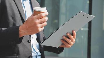 Businessman using tablet analyzing sales data and economic growth graph chart. Business strategy. Abstract icon. Digital marketing. video