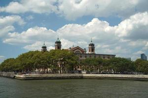 ellis island new york view cityscape from hudson river liberty island photo
