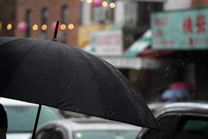 heavy rain in chinatown new york city photo