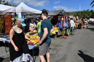 RAROTONGA, COOK ISLANDS - AUGUST 19 2017 - Tourist and locals at popular Saturday Market photo