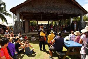 RAROTONGA, COOK ISLANDS - AUGUST 19 2017 - Tourist and locals at popular Saturday Market photo