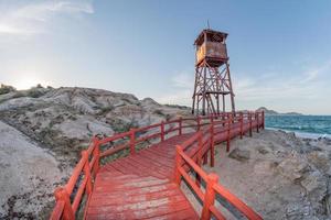 Red lighthouse footbridge Cabo Pulmo Baja California national park panorama photo